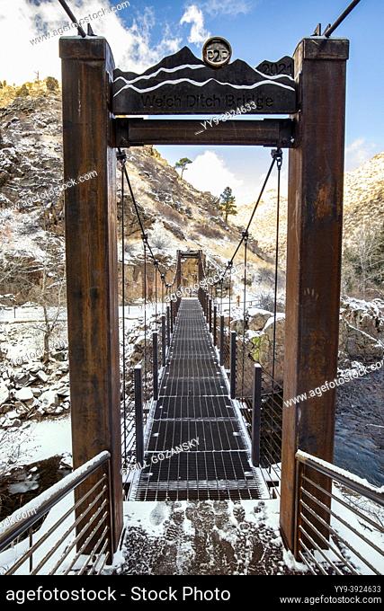 Suspension bridge on Welch Ditch Trail in Clear Creek Canyon. Part of the Peaks to Plains Trail - near Golden, Colorado, USA