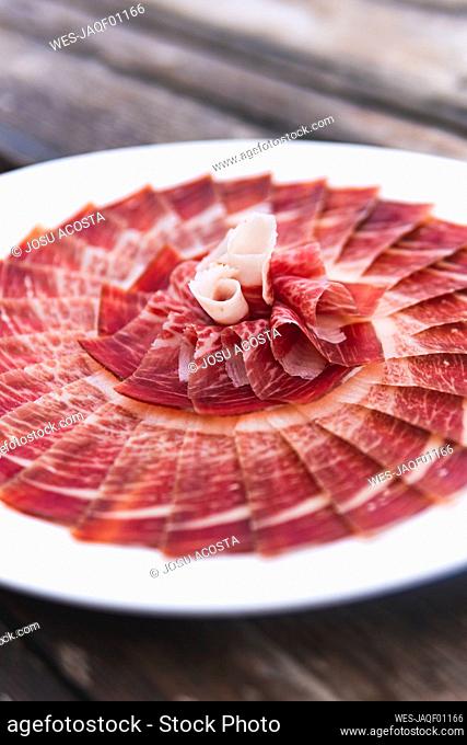 Elegantly presented plate of Iberian ham