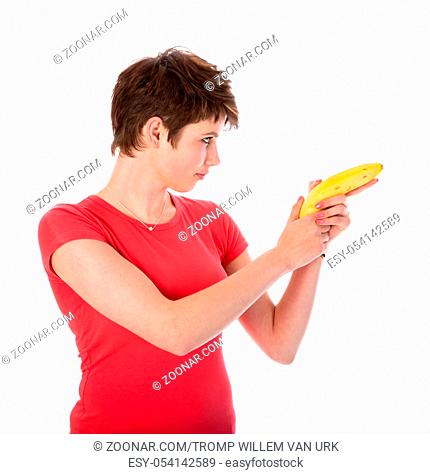 Woman shooting with a banana