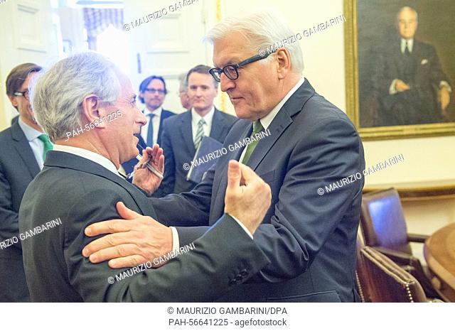 German Federal Minister of Foreign Affairs Frank-Walter Steinmeier (R) speaks with the chairman of the US Senate Committee on Foreign Relations, Bob Corker