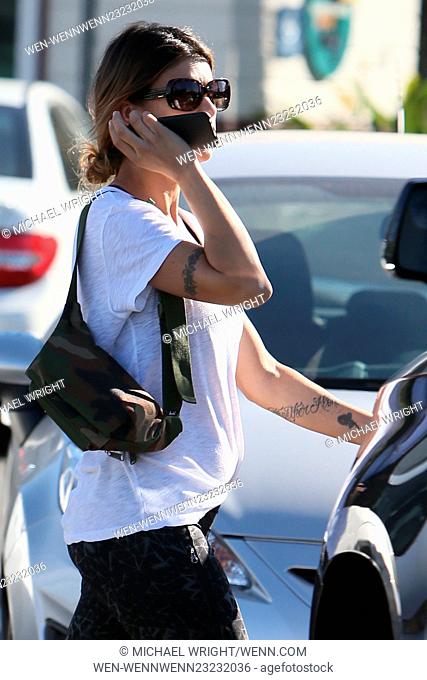 Elisabetta Canalis seen talking on a mobile phone while leaving the Grove Featuring: Elisabetta Canalis Where: Los Angeles, California
