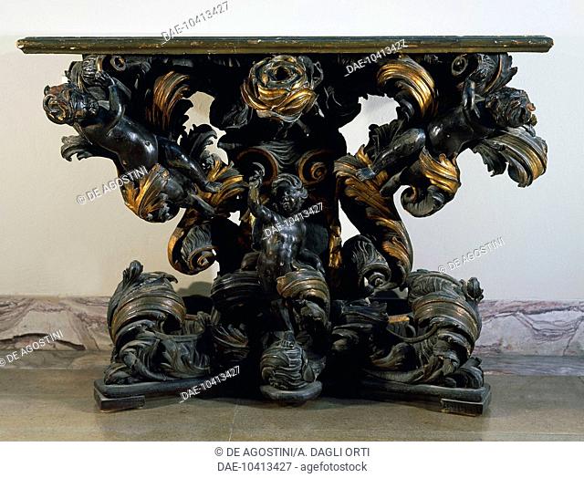 Baroque style carved and giltwood walnut console table, attributed to Andrea Fantoni (1659-1734). Italy, 17th century.  Bergamo