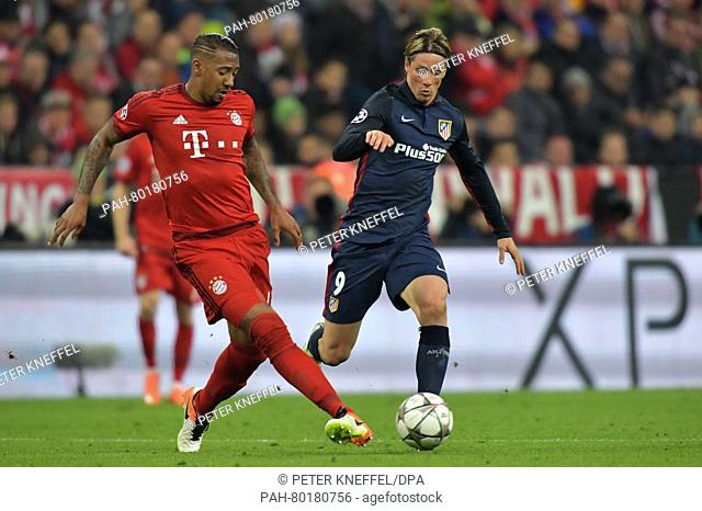 Munich's Jerome Boateng (L) in action against Madrid's Fernando Torres during the UEFA Champions League semi final second leg soccer match between Bayern Munich...
