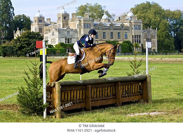 Horse and rider in the cross-country phase of an eventing competition, Charlton Park, Wiltshire, United Kingdom