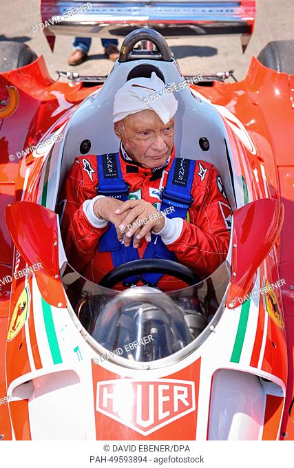 The non-executive chairman of Mercedes AMG, former Austrian Formula One driver Niki Lauda, steers his 1976 Ferrari 312T2 prior to the start of the 2014 Formula...