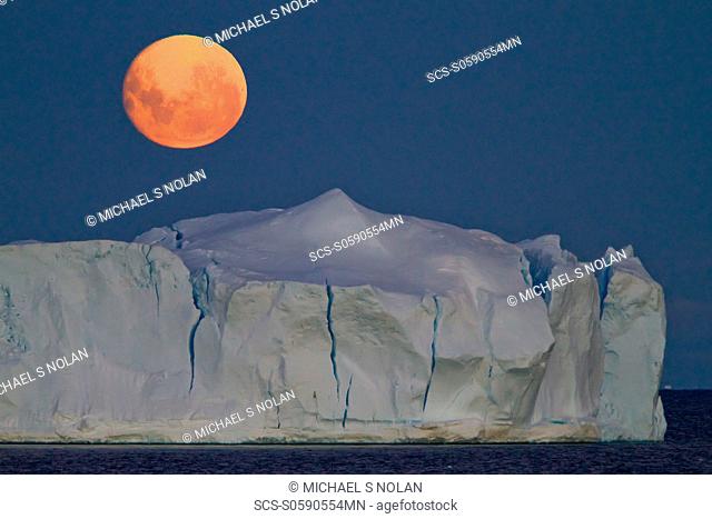Full moon plus 1 day rising over icebergs in the Weddell Sea, Antarctica MORE INFO This moonrise occurred on January 1, 2010