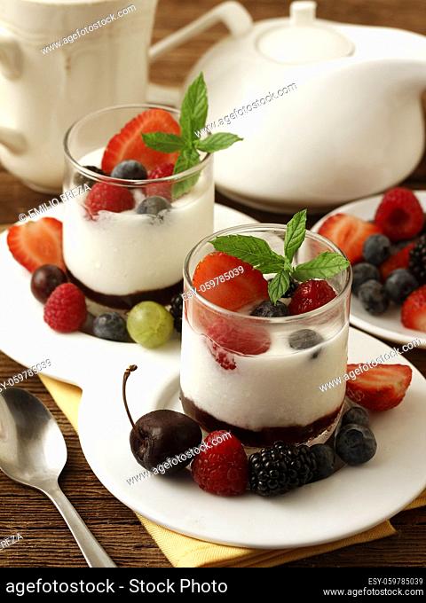 Yogurt with berries. Cherries, raspberries, blackberries, blueberries, goosberries, strawberries