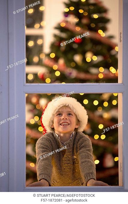 Young boy waiting for santa claus