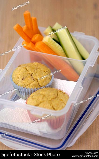 Corn muffins and vegetables for packed lunch