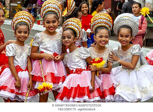 A Group Of Filipino Elementary Schoolchildren Pose For A Photo During The Tambor Trumpa Martsa Musika (Drum & Bugle Corps) Contest, Dinagyang Festival, Iloilo