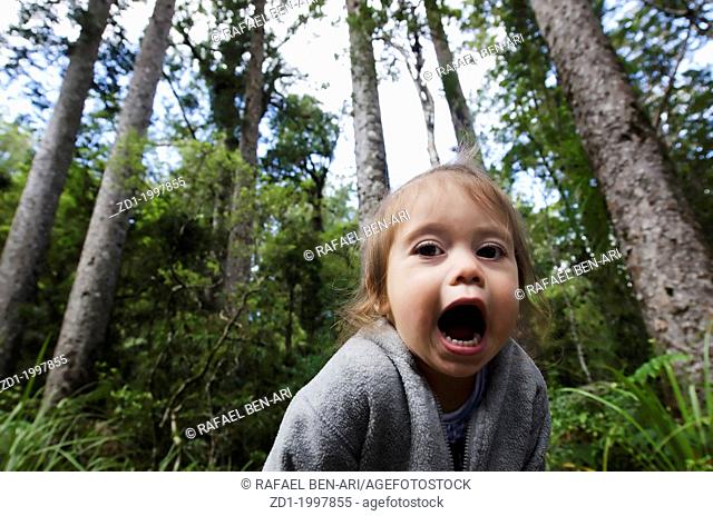 A girl screams in the forest