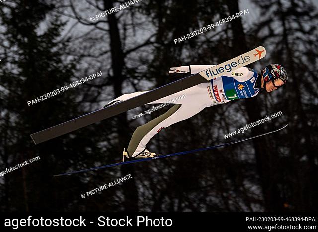 03 February 2023, Hesse, Willingen: Nordic skiing, ski jumping: World Cup, large hill, team jumping mixed. Marius Lindvik from Norway in action