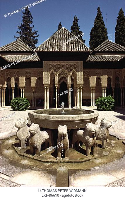 Courtyard of the Lions with fountain and arcades in the Moorish palace Alhambra, Granada, Andalusia, Spain