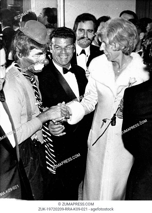 April 24, 1971 - Paris, France - Artists Union Gala comedian, actor JERRY LEWIS in costume as a clown meets politicians wife CLAUDE POMPIDOU after the...