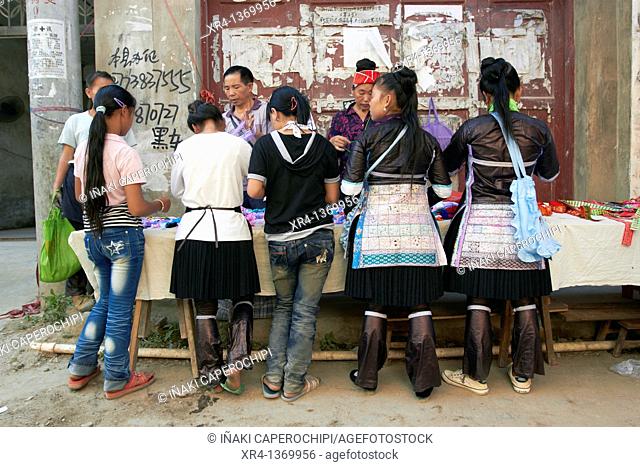 Women in traditional costumes, Market Rongjiang, Rongjiang, Guizhou, China