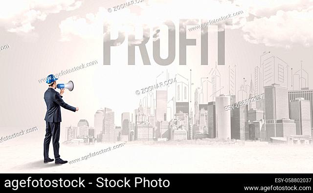 Young businessman with hard hat and PROFIT inscription, new business opportunity concept