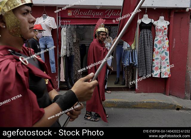 MEXICO CITY, MEXICO -APR 14, 2022: Persons dressed as Romans , take part during a procession of Holy Week that marks the Christian feast that opens the Easter...