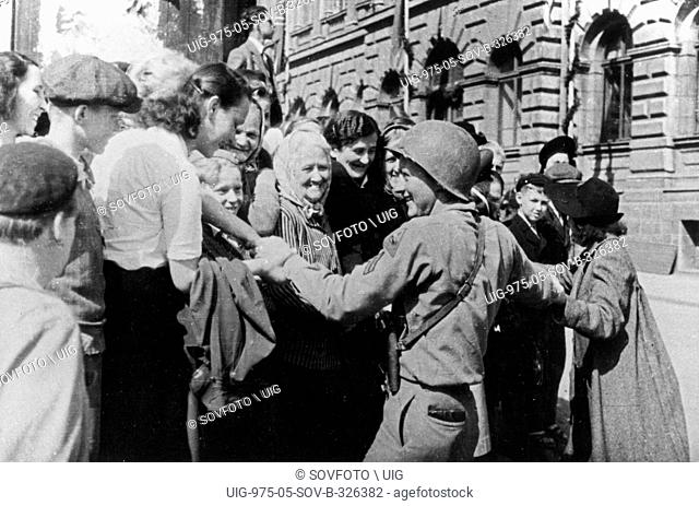 World War 2. The citizens of Pribram in Western Bohemia welcome their American liberators. 1945