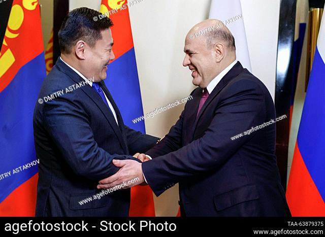 KYRGYZSTAN, BISHKEK - OCTOBER 25, 2023: Mongolia's Prime Minister Oyun-Erdene Luvsannamsrai (L) shakes hands with Russia's Prime Minister Mikhail Mishustin...