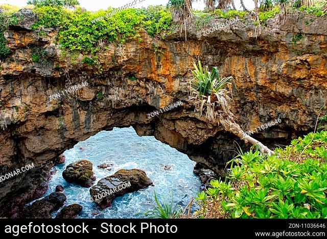 Natural land bridge Hufangalupe on the southern part of Tongatapu island in Tonga. It was formed when the roof of a sea cave collapsed