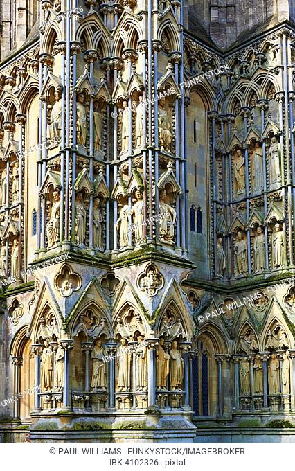 Statues on the facade of the medieval Wells Cathedral built in the Early English Gothic style in 1175, Wells, Somerset, England, United Kingdom