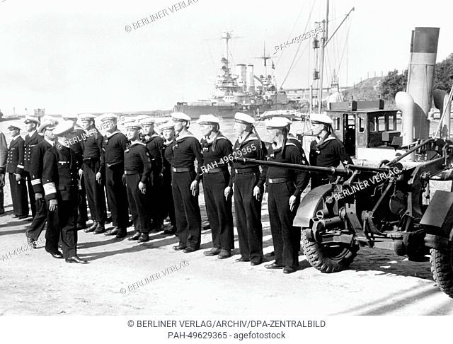 The Nazi propaganda picture shows German commander in chief of the German Navy, Fleet Admiral Erich Raeder inspecting the troops at the newly established...