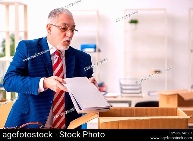 Old businessman employee in movement concept