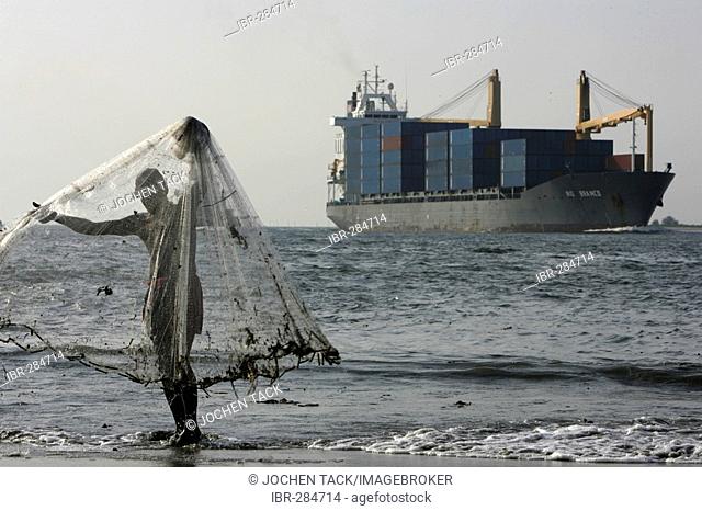 Net fisching and container ship, Fort Cochin, Kerala, India