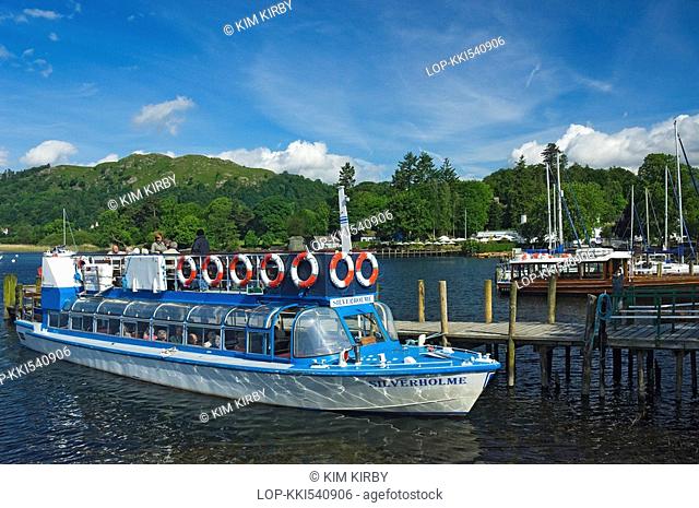 England, Cumbria, Ambleside, Tourists aboard a pleasure boat waiting to go on a tour on Lake Windermere