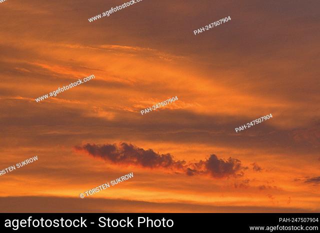 Schleswig, an impressive evening sky at sunset on a beautiful summer evening in July. - Schleswig/Schleswig-Holstein/Deutschland