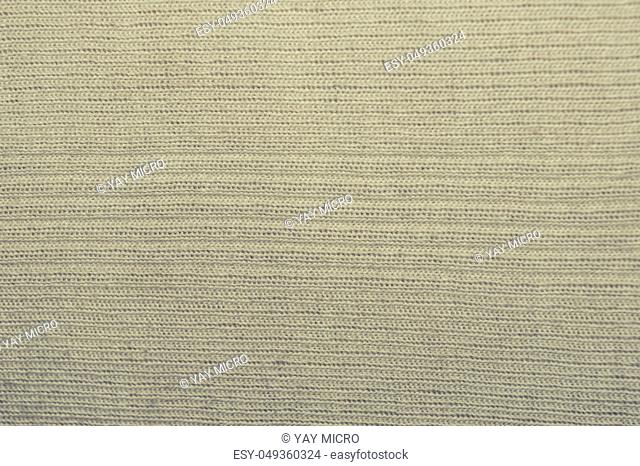 Close up abstract geometric pattern shape cotton print of light Zircon color fabric background. Seamless colorful cloth textile texture