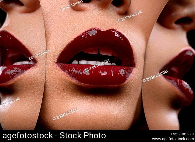 closeup shot of full sexy woman lips with red lipstick with mirror reflections. copyspace