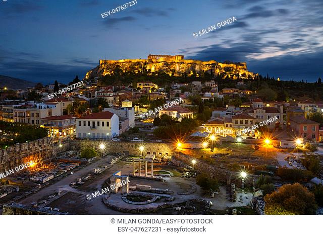 View of Acropolis from a roof top coctail bar at sunset, Greece.