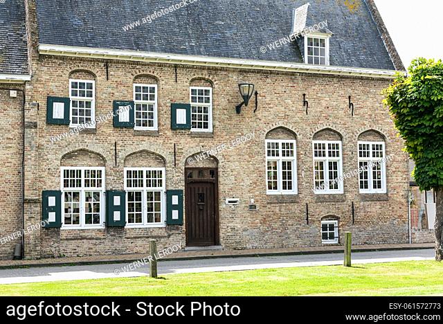 Lo-rening, West Flanders Region - Belgium. Traditional houses in the village at the Flemish countryside