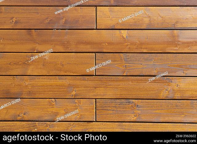 Background made of brown colored fir wood planks