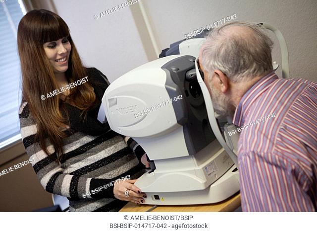Reportage in a ophtalmological practice in Geneva, Switzerland. The medical secretary carries out an optical biometry with an auto kerato-refracto tonometer