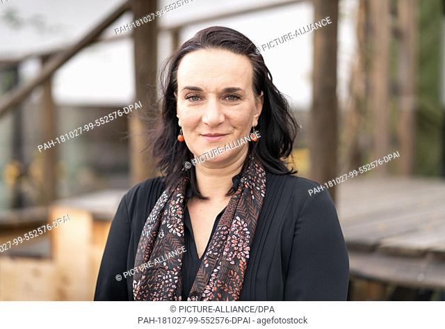 27 October 2018, Hessen, Darmstadt: 27 October 2018, Germany, Darmstadt: The German-Hungarian writer Terézia Mora stands on the terrace of the Darmstaedter...