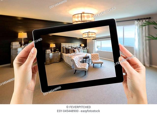Female Hands Holding Computer Tablet In Room with Photo on Screen