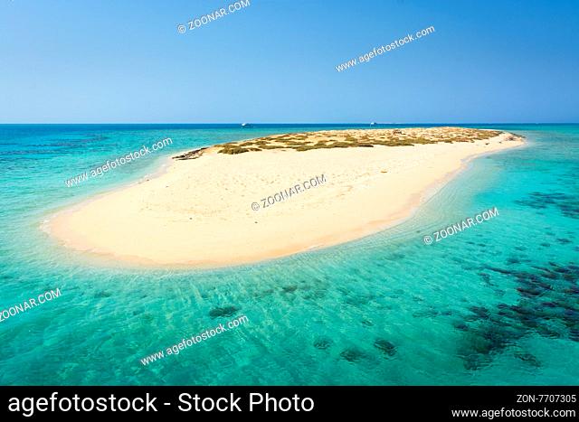 In the picture an atoll with fine white sand, turquoise sea, situated in the Red Sea in Egypt, between the area of Hamata and Berenice