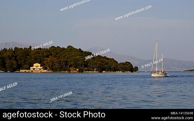 greece, greek islands, ionian islands, lefkada or lefkas, bay of nidri, view of the offshore island in the middle distance, mainland in the background