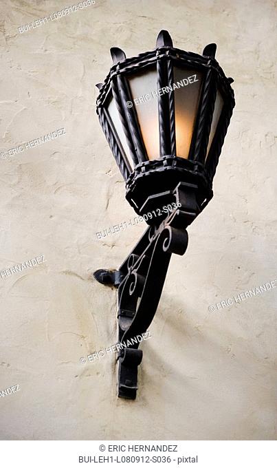 Exterior wrought iron sconce