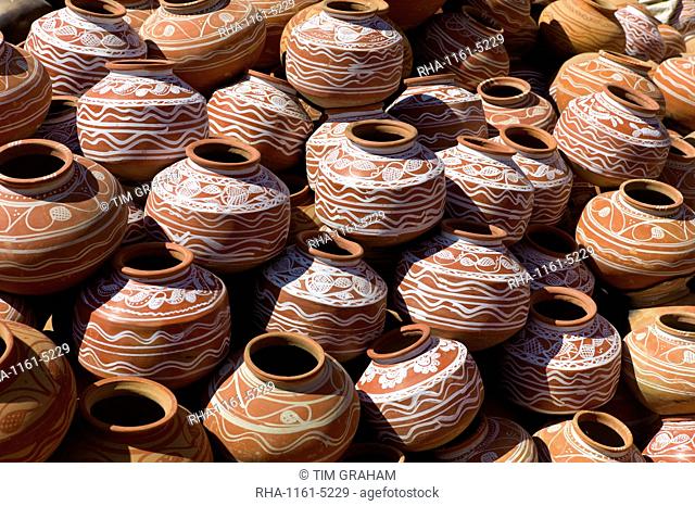 Clay water pots on sale in old town Udaipur, Rajasthan, Western India