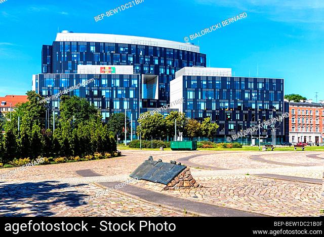 Gdansk, Pomerania / Poland - 2020/07/14: Modern office buildings in old Gdansk Shipyard quarter surrounding European Solidarity Centre and Solidarnosci square
