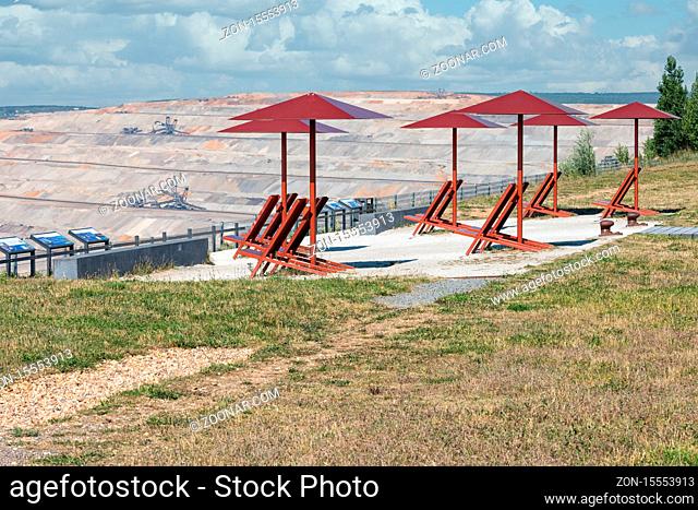 Viewpoint with seats and information panels near Hambach brown coal mine in Germany