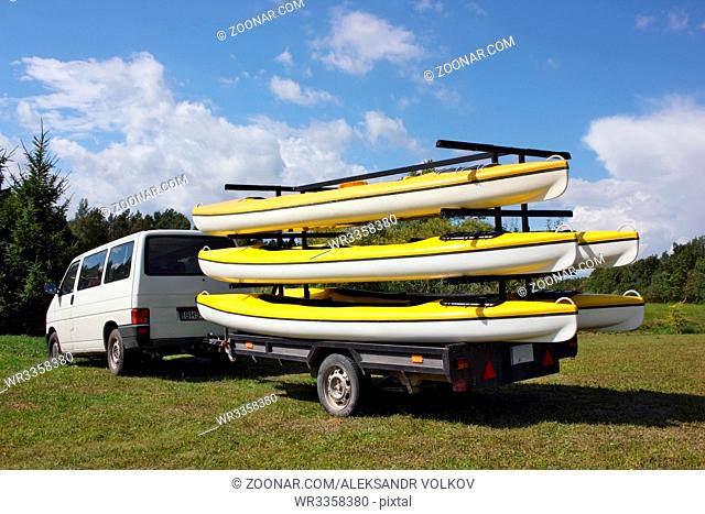 VILNIUS, LITHUANIA - AUGUST 28, 2015: Tourist kayaks in the trailer for transportation to the river. In a year Lithuania is visited by more than 2 million...