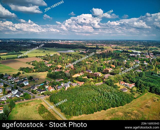De Pinte, Belgium, August 2020: Aerial view of the suburbs of Ghent in De Pinte, residential area mixed with agriculture