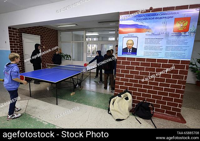 RUSSIA, ZAPOROZHYE REGION - DECEMBER 18, 2023: Kids play table tennis at school No 4 in the town of Pologi. The school has 440 students who come from nearby...