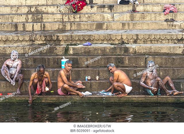 Indian People bathing on a ghat, Varanasi, Uttar Pradesh, India, Asia