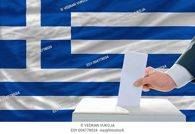 man voting on elections in greece