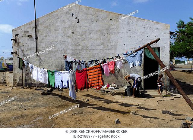 Clothesline in front of house at the harbour of Palmeira, Sal, Cape Verde, Africa